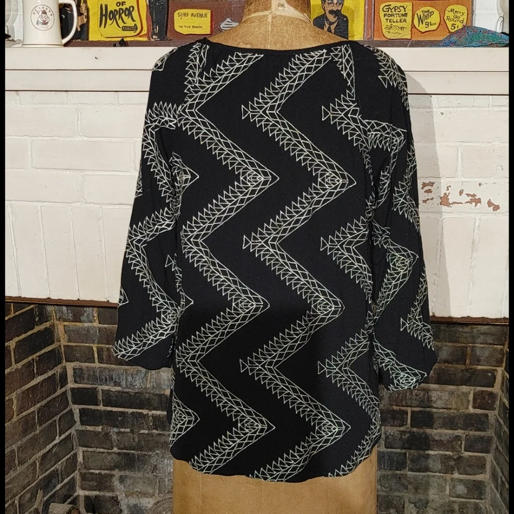 Lovestitch top- love tassels? I do